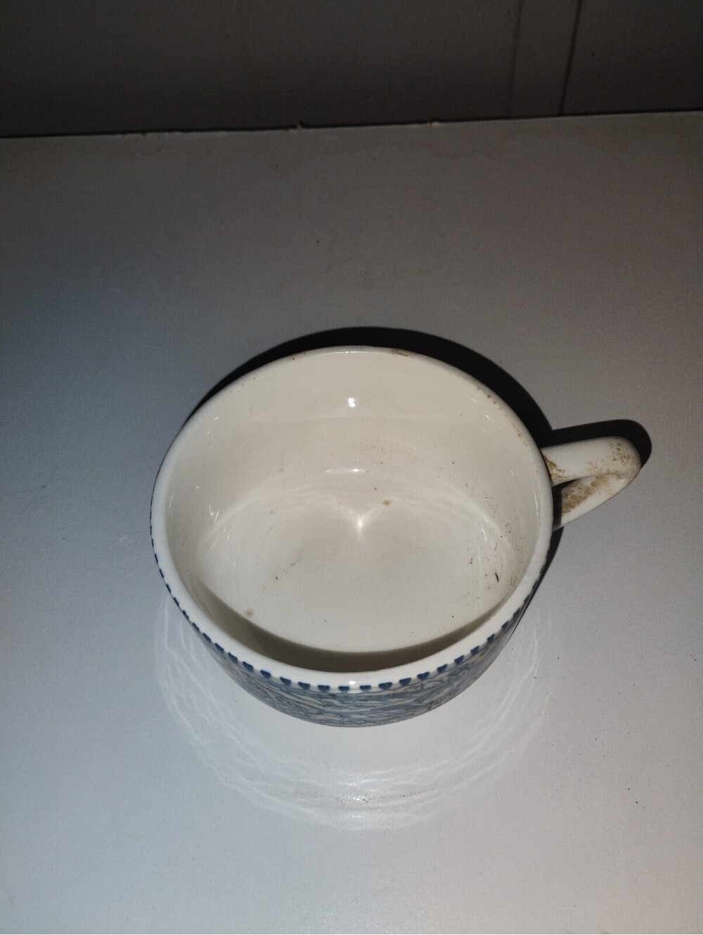 Vintage Blue and White Ceramic Cup with Horse and Carriage Design - Picture 4 of 5